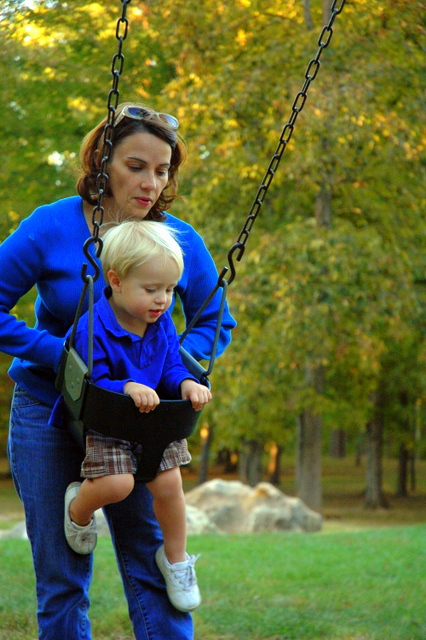 boy in swing, fall, park, leaves